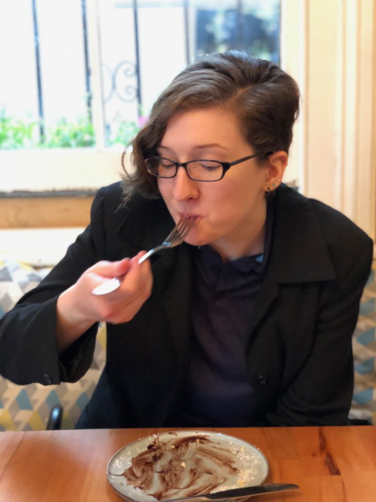 Trish taking the last bite of lemon tart at Little Sweeties